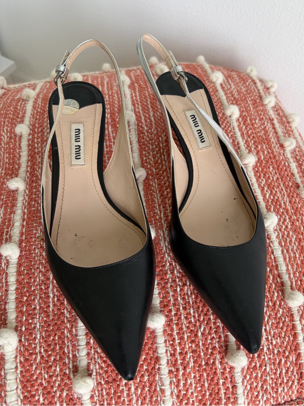 Miu Miu two toned  kitten heel sling back pumps.